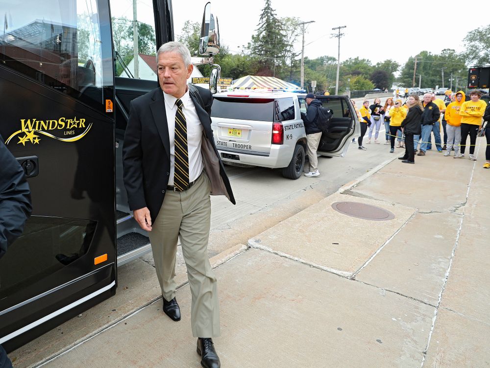 Iowa Hawkeyes head coach Kirk Ferentz steps off the bus as he arrives with his team before their game at Kinnick Stadium in Iowa City on Saturday, Sep 28, 2019. (Stephen Mally/hawkeyesports.com)