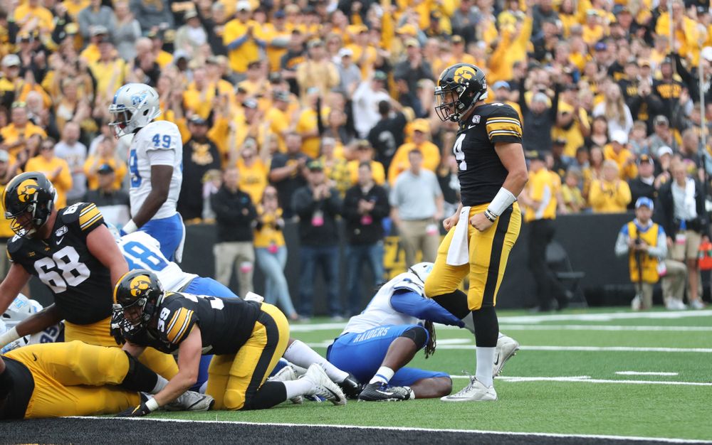 Iowa Hawkeyes quarterback Nate Stanley (4) celebrates a touchdown against Middle Tennessee State Saturday, September 28, 2019 at Kinnick Stadium. (Max Allen/hawkeyesports.com)