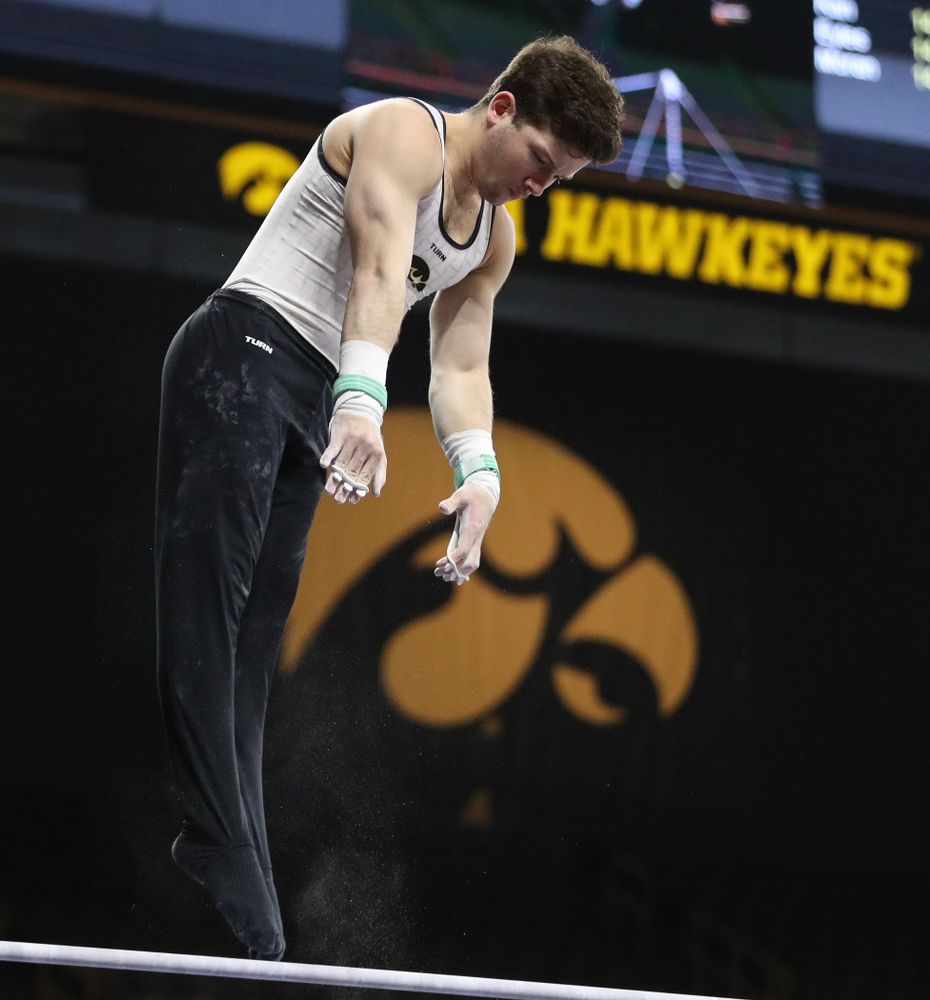 Iowa's Rogelio Vazquez competes on the high bar against UIC and Minnesota Saturday, February 2, 2019 at Carver-Hawkeye Arena. (Brian Ray/hawkeyesports.com)