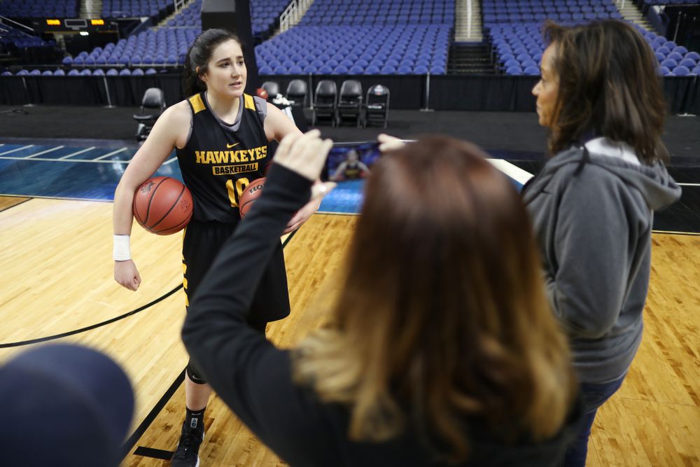 Iowa Hawkeyes forward Megan Gustafson (10) talks with the ESPN Crew following practice for their Sweet 16 matchup against NC State Friday, March 29, 2019 at the Greensboro Coliseum in Greensboro, NC.(Brian Ray/hawkeyesports.com)