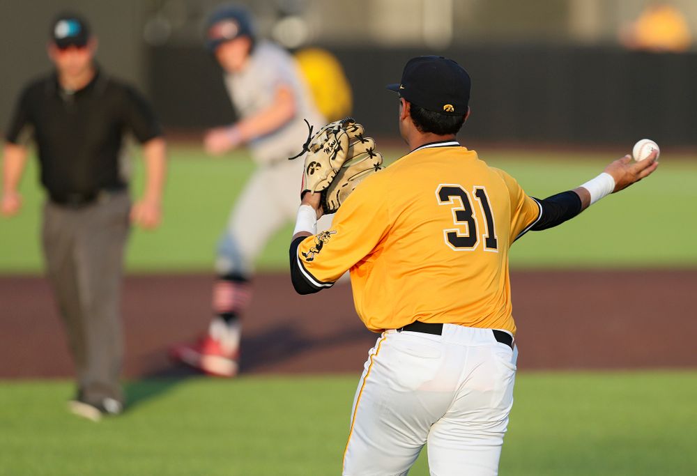 Iowa Hawkeyes shortstop Matthew Sosa (31) throws to second base to start a double play during the eighth inning of their game against Northern Illinois at Duane Banks Field in Iowa City on Tuesday, Apr. 16, 2019. (Stephen Mally/hawkeyesports.com)