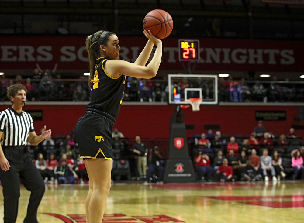 Iowa guard Gabbie Marshall (24) makes a 3-pointer during overtime of their game at the Rutgers Athletic Center in Piscataway, N.J. on Sunday, March 1, 2020. (Stephen Mally/hawkeyesports.com)