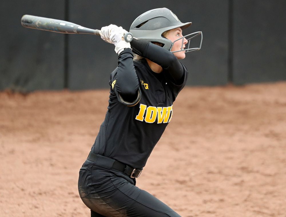 Iowa’s Aralee Bogar (2) hits an RBI triple during the sixth inning of their game against Iowa Softball vs Indian Hills Community College at Pearl Field in Iowa City on Sunday, Oct 6, 2019. (Stephen Mally/hawkeyesports.com)