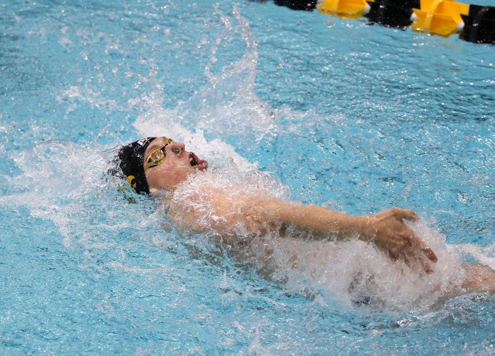 IowaÕs John Colin competes in the 100 yard backstroke against Notre Dame and Illinois Saturday, January 11, 2020 at the Campus Recreation and Wellness Center.  (Brian Ray/hawkeyesports.com)