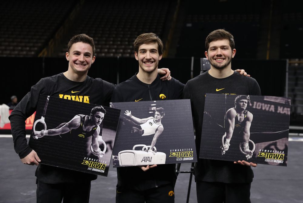 Iowa Men's Gymnastics seniors Jake Brodarzon, Kevin Johnson, and Rogelio Vazquez during senior day ceremonies following their meet against the Ohio State Buckeyes  Saturday, March 16, 2019 at Carver-Hawkeye Arena.  (Brian Ray/hawkeyesports.com)