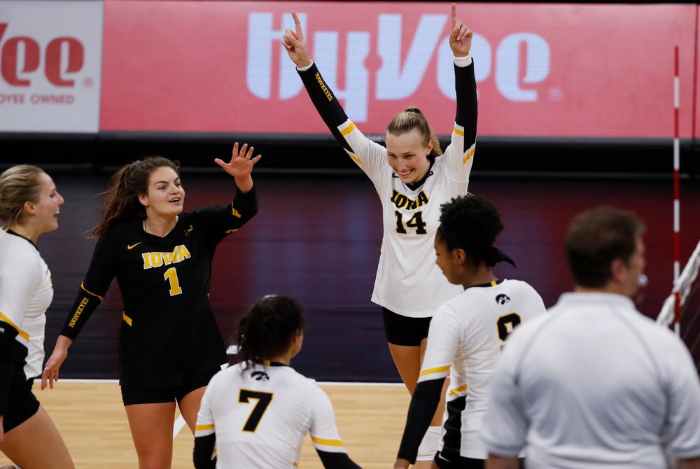 Iowa Hawkeyes outside hitter Cali Hoye (14) and defensive specialist Molly Kelly (1) against Eastern Illinois Sunday, September 9, 2018 at Carver-Hawkeye Arena. (Brian Ray/hawkeyesports.com)