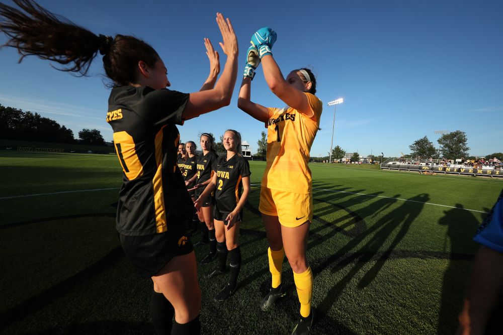 Iowa Hawkeyes forward Devin Burns (30) and goalkeeper Claire Graves (1) against Western Michigan Thursday, August 22, 2019 at the Iowa Soccer Complex. (Brian Ray/hawkeyesports.com)