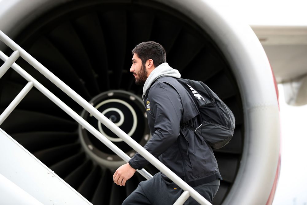 Iowa Hawkeyes defensive end A.J. Epenesa (94) boards the team plane Wednesday, December 26, 2018 as they travel to Tampa, Florida for the Outback Bowl. (Brian Ray/hawkeyesports.com)