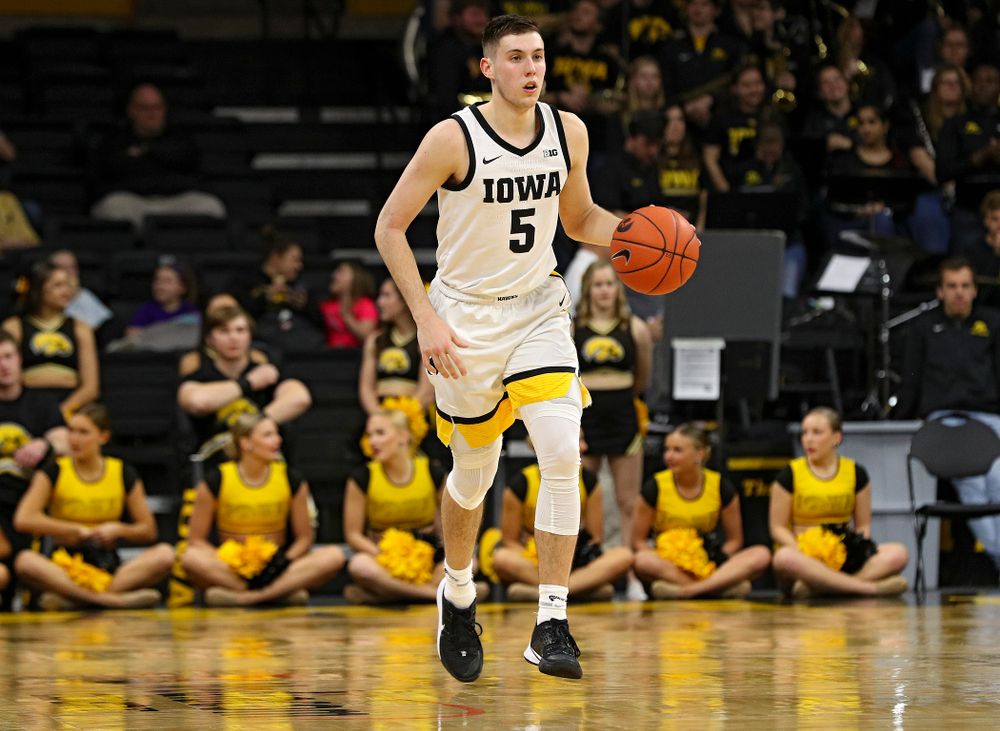 Iowa Hawkeyes guard CJ Fredrick (5) brings the ball down the court during the second half of their game at Carver-Hawkeye Arena in Iowa City on Sunday, Nov 24, 2019. (Stephen Mally/hawkeyesports.com)