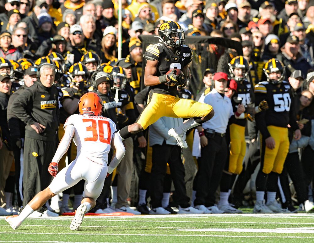 Iowa Hawkeyes wide receiver Ihmir Smith-Marsette (6) pulls in a pass during the third quarter of their game at Kinnick Stadium in Iowa City on Saturday, Nov 23, 2019. (Stephen Mally/hawkeyesports.com)