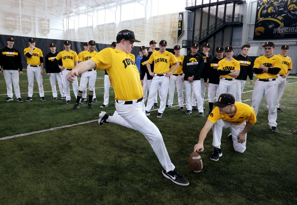 Iowa Hawkeyes first baseman Peyton Williams (45) attempts to kick a field goal before practice Thursday, February 6, 2020 at the Indoor Practice Facility. (Brian Ray/hawkeyesports.com)