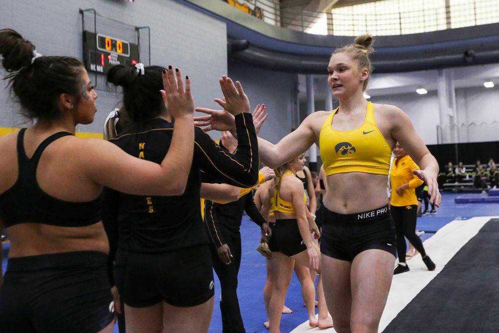 Allyson Steffensmeier high fives teammates during the Iowa women’s gymnastics Black and Gold Intraquad Meet on Saturday, December 7, 2019 at the UI Field House. (Lily Smith/hawkeyesports.com)