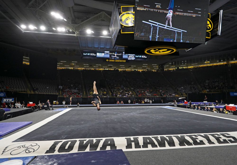 Iowa's Kulani Taylor competes in the floor during the first day of the Big Ten Men's Gymnastics Championships at Carver-Hawkeye Arena in Iowa City on Friday, Apr. 5, 2019. (Stephen Mally/hawkeyesports.com)