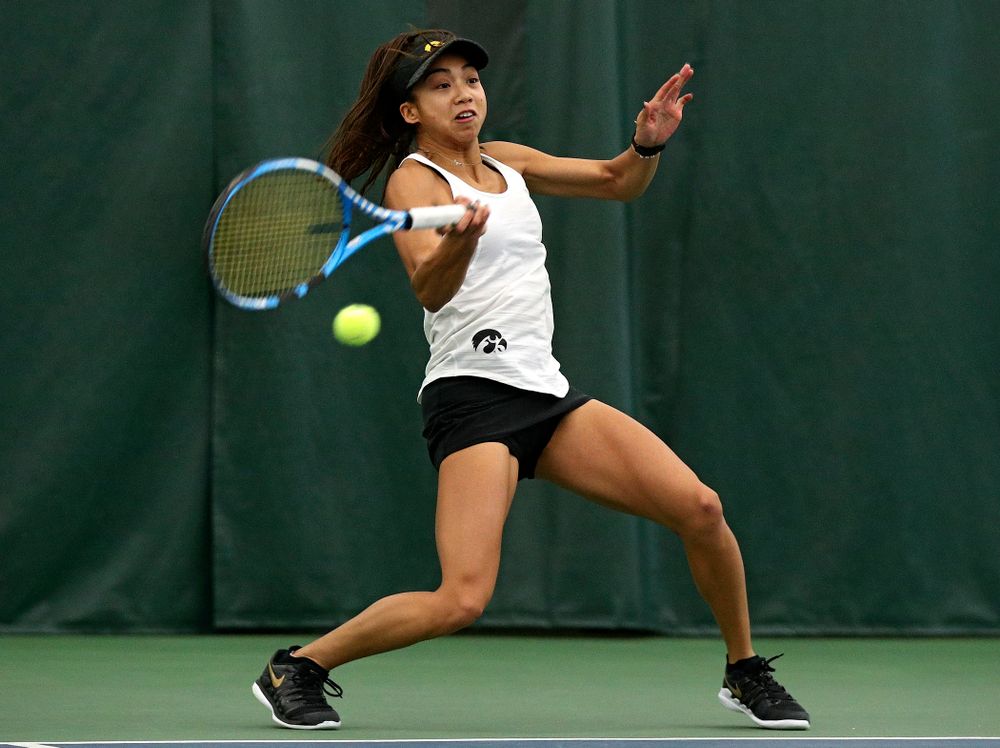 Iowa’s Michelle Bacalla returns a shot during her doubles match at the Hawkeye Tennis and Recreation Complex in Iowa City on Sunday, February 23, 2020. (Stephen Mally/hawkeyesports.com)