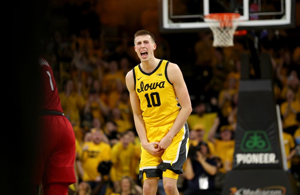Iowa Hawkeyes guard Joe Wieskamp (10) celebrates after making his 100th career three point basket against the Rutgers Scarlet Knights  Wednesday, January 22, 2020 at Carver-Hawkeye Arena. (Brian Ray/hawkeyesports.com)