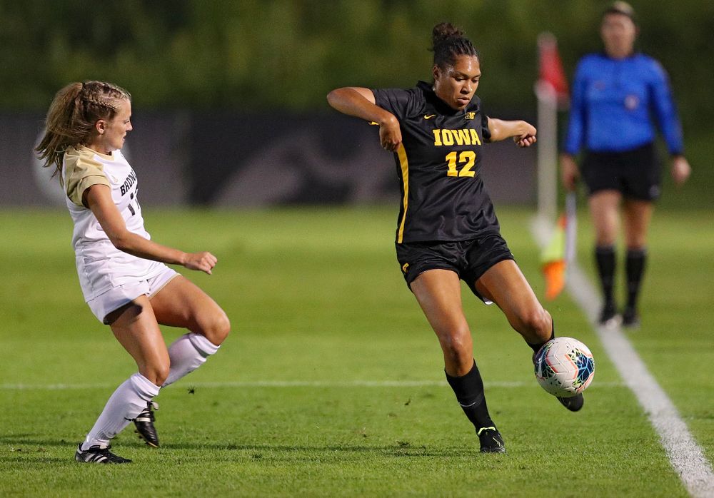 Iowa forward Olivia Fiegel (12) passes the ball during the second half of their match against Western Michigan at the Iowa Soccer Complex in Iowa City on Thursday, Aug 22, 2019. (Stephen Mally/hawkeyesports.com)