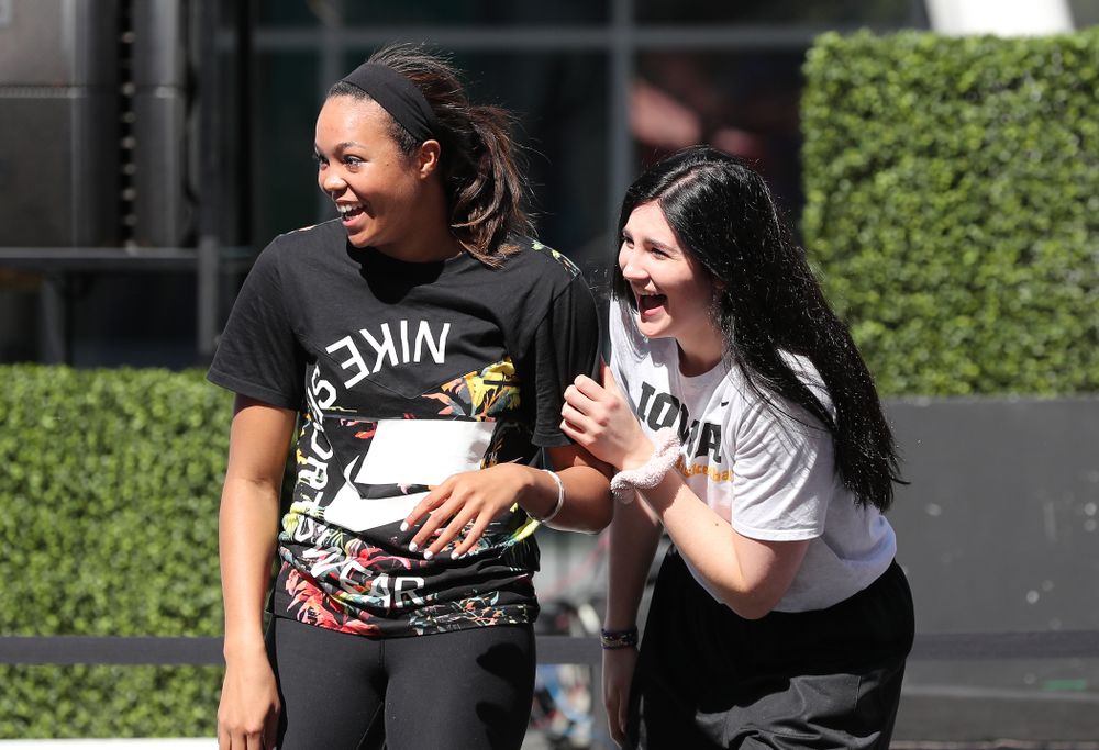 Iowa Hawkeyes forward Megan Gustafson (10) and UCONNÕs Napheesa Collier during a Special Olympics event Friday, April 12, 2019 as part of the ESPN College Basketball Awards in the XBOX Plaza at LA Live.  (Brian Ray/hawkeyesports.com)
