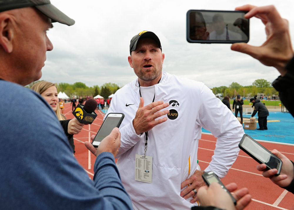 Iowa Director of Track and Field Joey Woody taps the Raff sticker on his shirt as he talks with reporters after winning the Men's Big Ten Outdoor Track and Field Championships on the third day of the Big Ten Outdoor Track and Field Championships at Francis X. Cretzmeyer Track in Iowa City on Sunday, May. 12, 2019. (Stephen Mally/hawkeyesports.com)