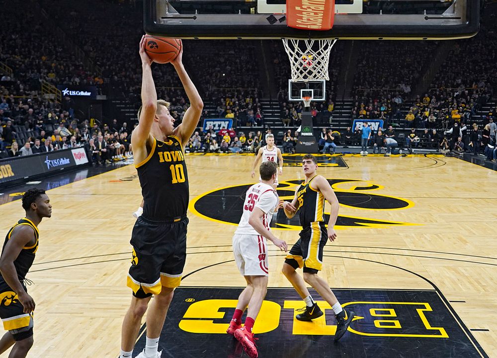 Iowa Hawkeyes guard Joe Wieskamp (10) pulls in a rebound during the second half of their game at Carver-Hawkeye Arena in Iowa City on Monday, January 27, 2020. (Stephen Mally/hawkeyesports.com)