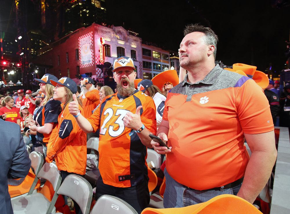 Broncos fans celebrate the selection of Noah Fant 
