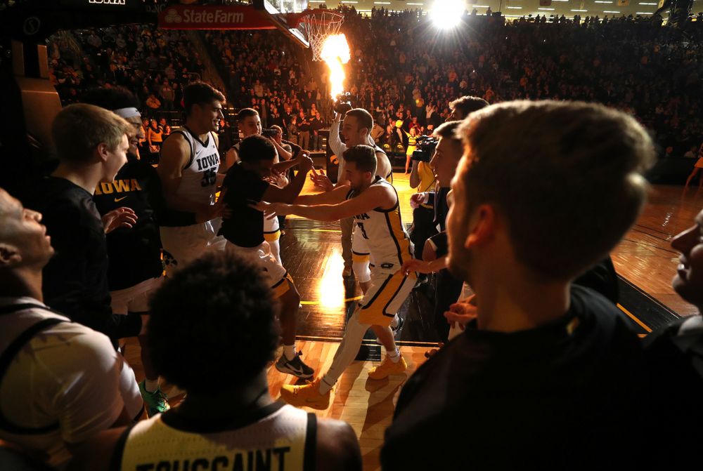 The Iowa Hawkeyes get pumped up before their game against the Minnesota Golden Gophers Monday, December 9, 2019 at Carver-Hawkeye Arena. (Brian Ray/hawkeyesports.com)