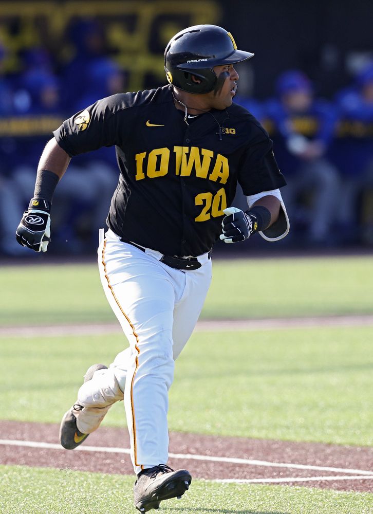 Iowa infielder Izaya Fullard (20) runs to first base after getting a hit during the first inning of their college baseball game at Duane Banks Field in Iowa City on Tuesday, March 10, 2020. (Stephen Mally/hawkeyesports.com)