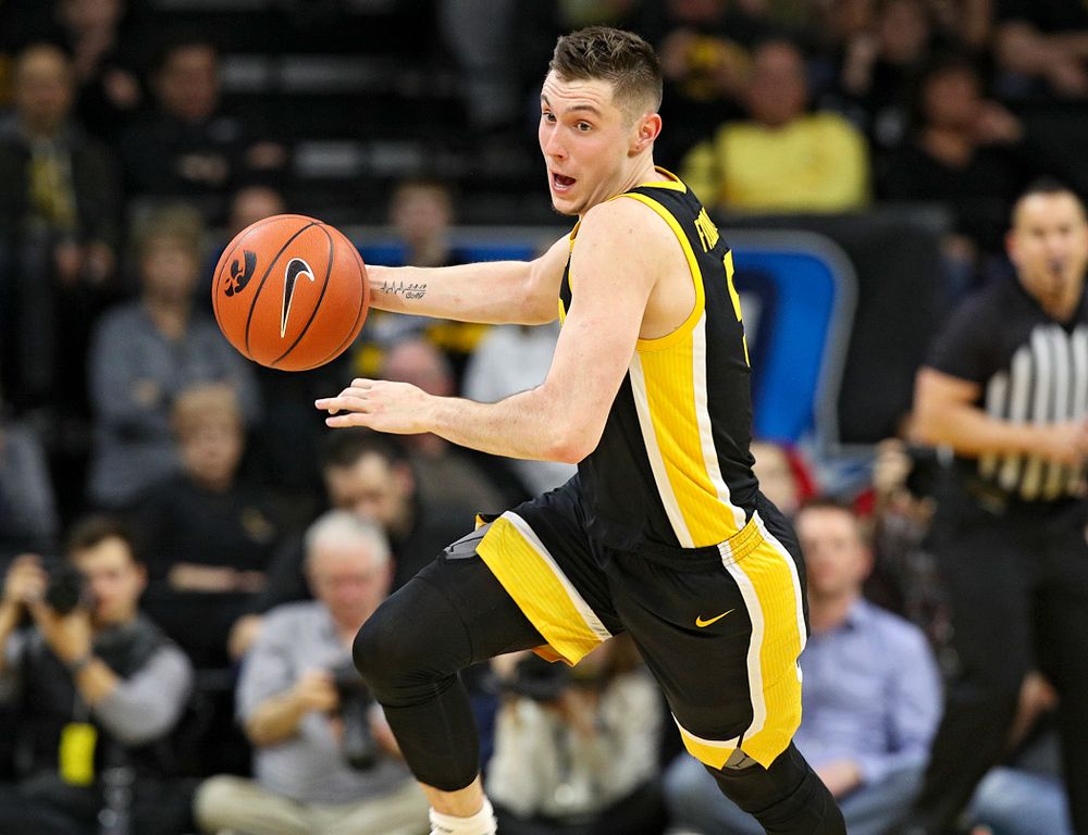 Iowa Hawkeyes guard CJ Fredrick (5) brings the ball down the floor during the first half of their game at Carver-Hawkeye Arena in Iowa City on Monday, January 27, 2020. (Stephen Mally/hawkeyesports.com)