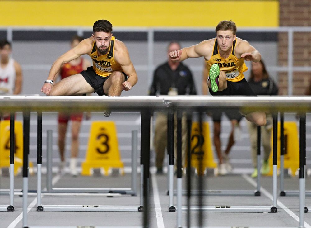 Iowa’s Josh Braverman (from left) and Will Daniels compete in the men’s 60 meter hurdles prelims event during the Jimmy Grant Invitational at the Recreation Building in Iowa City on Saturday, December 14, 2019. (Stephen Mally/hawkeyesports.com)