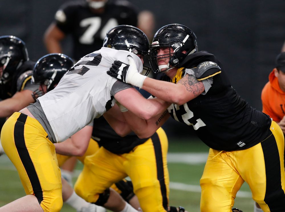 Iowa Hawkeyes offensive lineman Coy Kirkpatrick (72) and Iowa Hawkeyes defensive end Jack Kallenberger (82) during spring practice Wednesday, March 28, 2018 at the Hansen Football Performance Center.  (Brian Ray/hawkeyesports.com)