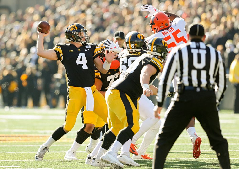 Iowa Hawkeyes quarterback Nate Stanley (4) looks to throw during the second quarter of their game at Kinnick Stadium in Iowa City on Saturday, Nov 23, 2019. (Stephen Mally/hawkeyesports.com)