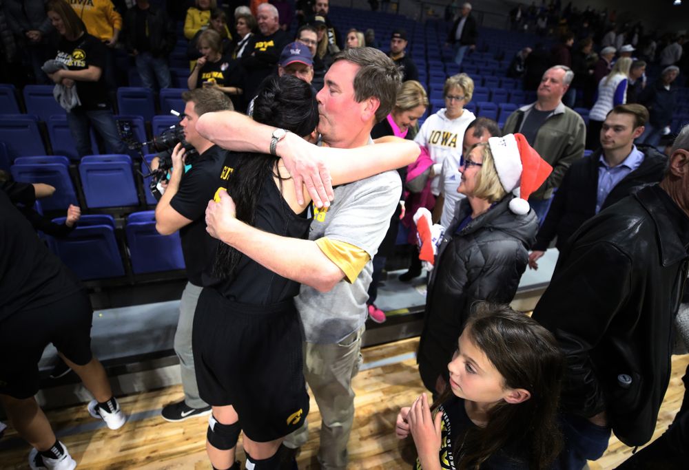 Iowa Hawkeyes forward Megan Gustafson (10) hugs her father Clendon following their win over the Drake Bulldogs Friday, December 21, 2018 at the Knapp Center in Des Moines. (Brian Ray/hawkeyesports.com)