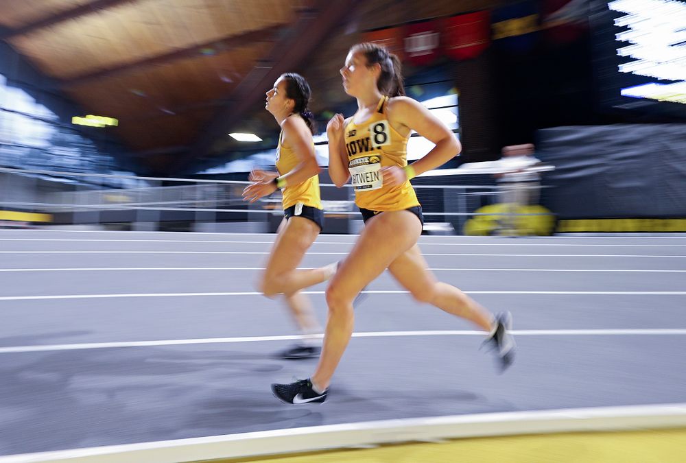 Iowa’s Wren Renquist (from left) and Maggie Gutwein run the women’s 3000 meter run event during the Hawkeye Invitational at the Recreation Building in Iowa City on Saturday, January 11, 2020. (Stephen Mally/hawkeyesports.com)