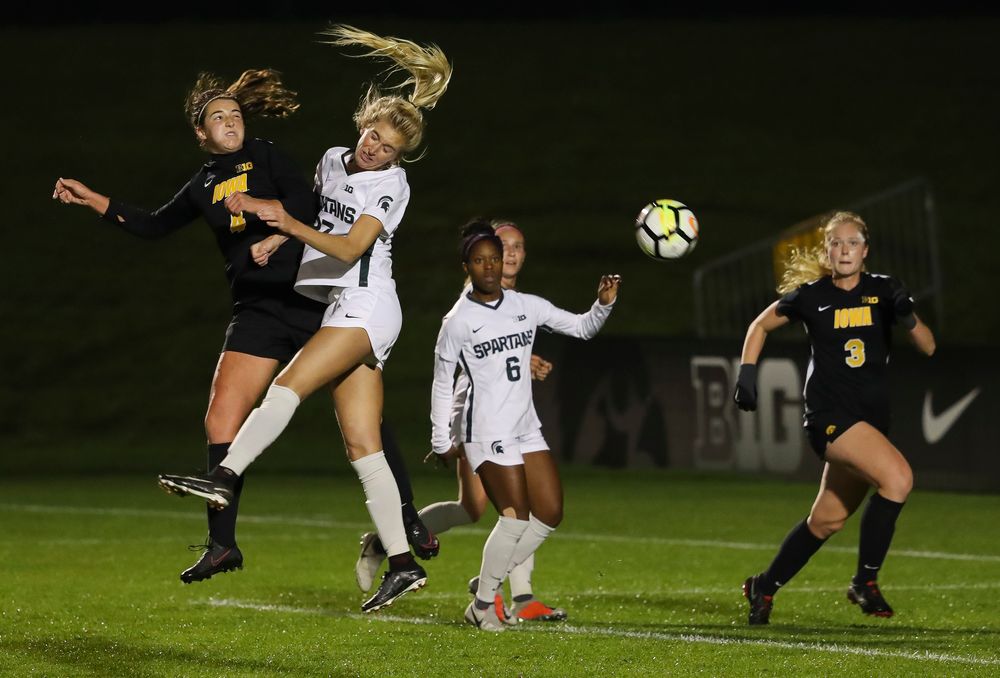 Iowa Hawkeyes forward Kaleigh Haus (4) heads the ball during a game against Michigan State at the Iowa Soccer Complex on October 12, 2018. (Tork Mason/hawkeyesports.com)