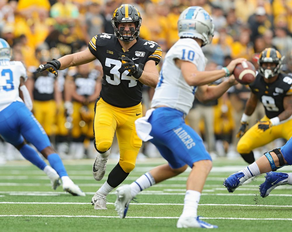 Iowa Hawkeyes linebacker Kristian Welch (34) closes in on Middle Tennessee State quarterback Asher O’Hara (10) during the first quarter of their game at Kinnick Stadium in Iowa City on Saturday, Sep 28, 2019. (Stephen Mally/hawkeyesports.com)