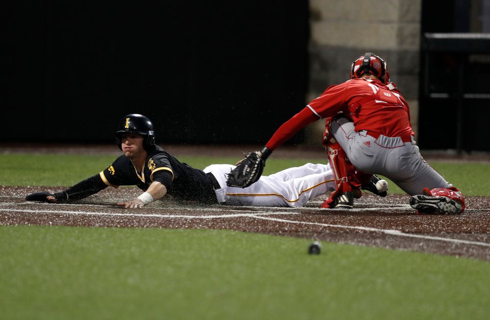 Iowa Hawkeyes catcher Tyler Cropley (5) scores against the Bradley Braves Wednesday, March 28, 2018 at Duane Banks Field. (Brian Ray/hawkeyesports.com)