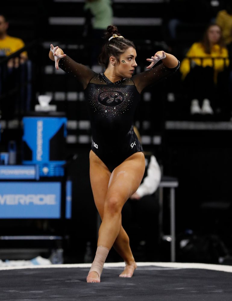 Nikki Youd competes on the floor  