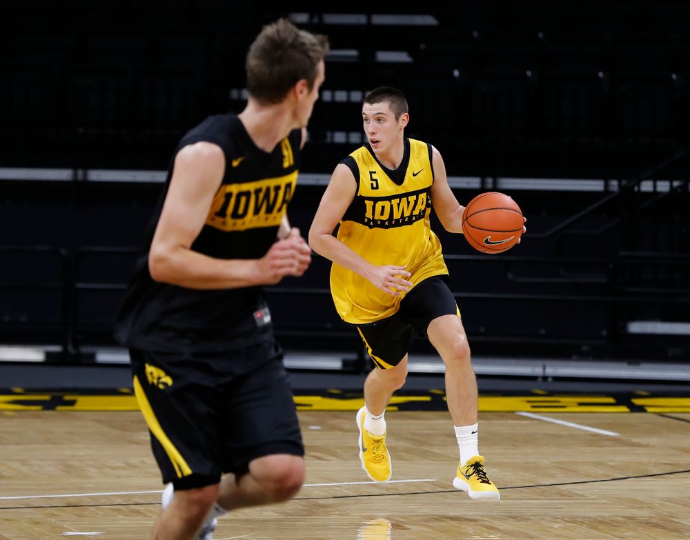 Iowa Hawkeyes guard CJ Fredrick (5) brings the ball up the court during the first practice of the season Monday, October 1, 2018 at Carver-Hawkeye Arena. (Brian Ray/hawkeyesports.com)