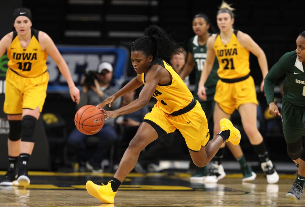 Iowa Hawkeyes guard Tomi Taiwo (1) steals the ball against the Michigan State Spartans Thursday, February 7, 2019 at Carver-Hawkeye Arena. (Brian Ray/hawkeyesports.com)