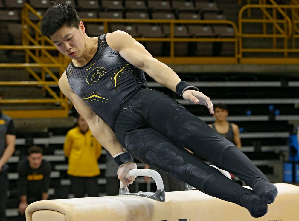 Iowa's Bennet Huang competes in the pommel horse against Ohio State at Caver-Hawkeye Arena in Iowa City on Saturday, Mar. 16, 2019. (Stephen Mally for HawkeyeSports.com)