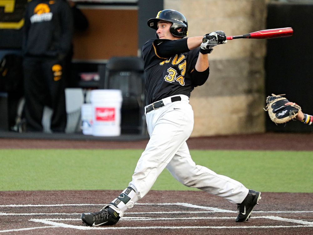 Iowa catcher Austin Martin (34) drives a pitch for a hit during the seventh inning of the first game of the Black and Gold Fall World Series at Duane Banks Field in Iowa City on Tuesday, Oct 15, 2019. (Stephen Mally/hawkeyesports.com)