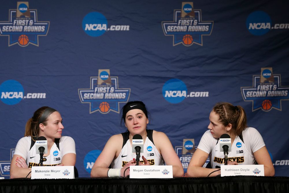 Iowa Hawkeyes guard Makenzie Meyer (3), center Megan Gustafson (10), and guard Kathleen Doyle (22) during a press conference after winning their second round game in the 2019 NCAA Women's Basketball Tournament at Carver Hawkeye Arena in Iowa City on Sunday, Mar. 24, 2019. (Stephen Mally for hawkeyesports.com)