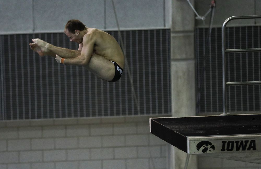 Iowa's Anton Hoherz competes in the platform diving competition during the third day of the Hawkeye Invitational at the Campus Recreation and Wellness Center on November 17, 2018. (Tork Mason/hawkeyesports.com)