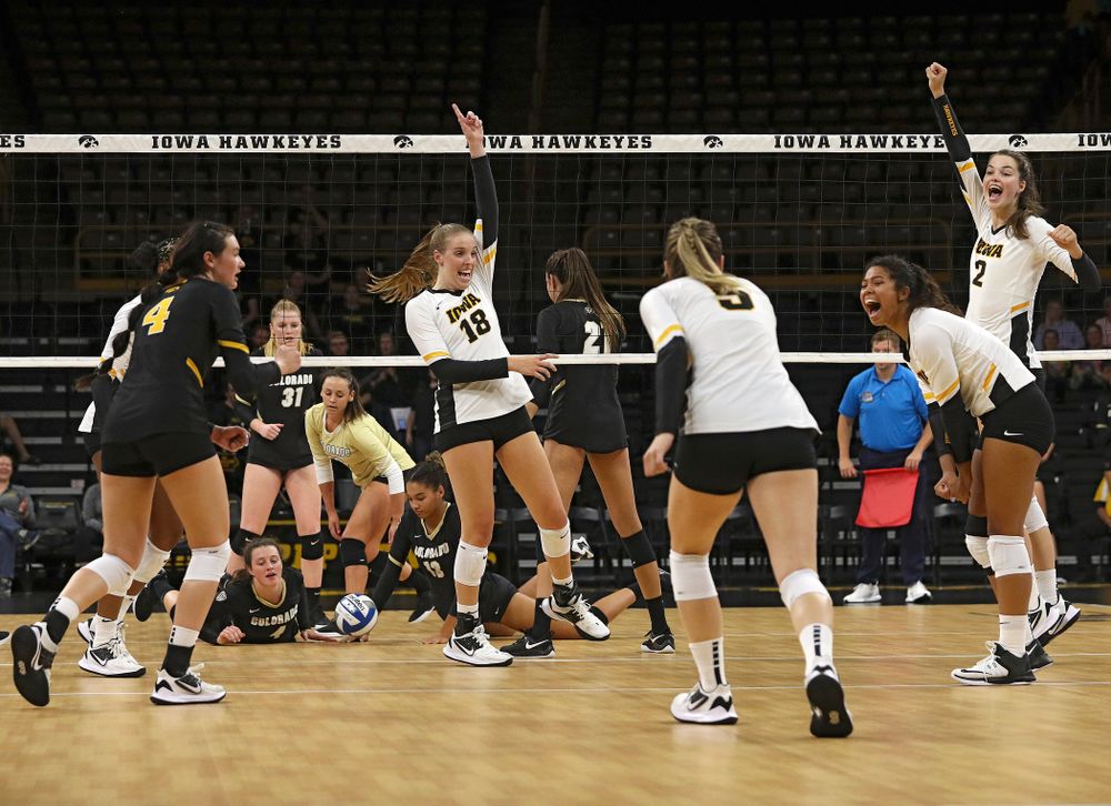 Iowa’s Griere Hughes (10), Halle Johnston (4), Hannah Clayton (18), Meghan Buzzerio (5), Brie Orr (7), and Courtney Buzzerio (2) celebrate a score during the first set of their Big Ten/Pac-12 Challenge match against Colorado at Carver-Hawkeye Arena in Iowa City on Friday, Sep 6, 2019. (Stephen Mally/hawkeyesports.com)