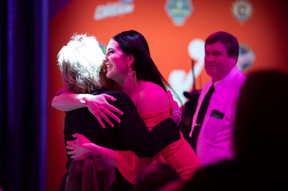 Iowa Hawkeyes forward Megan Gustafson (10) hugs head coach Lisa Bluder after being selected by the Dallas Wings in the second round of the 2019 WNBA Draft Wednesday, April 10, 2019 at Nike New York Headquarters in New York City. (Brian Ray/hawkeyesports.com)