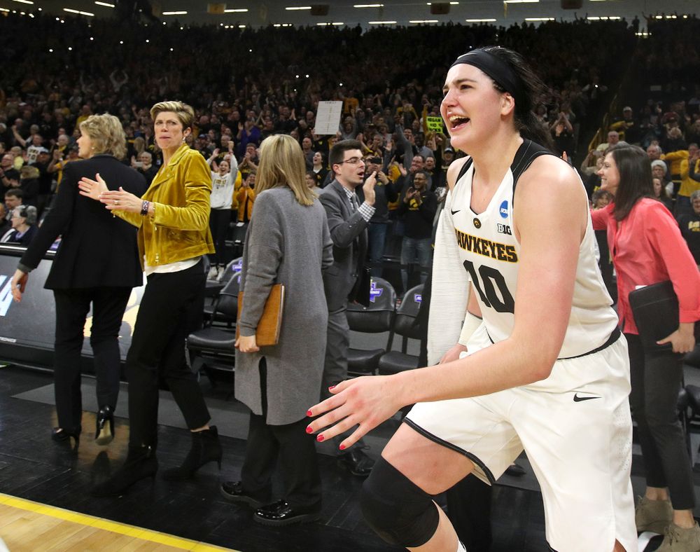 Iowa Hawkeyes center Megan Gustafson (10) runs onto the court after winning their second round game in the 2019 NCAA Women's Basketball Tournament at Carver Hawkeye Arena in Iowa City on Sunday, Mar. 24, 2019. (Stephen Mally for hawkeyesports.com)