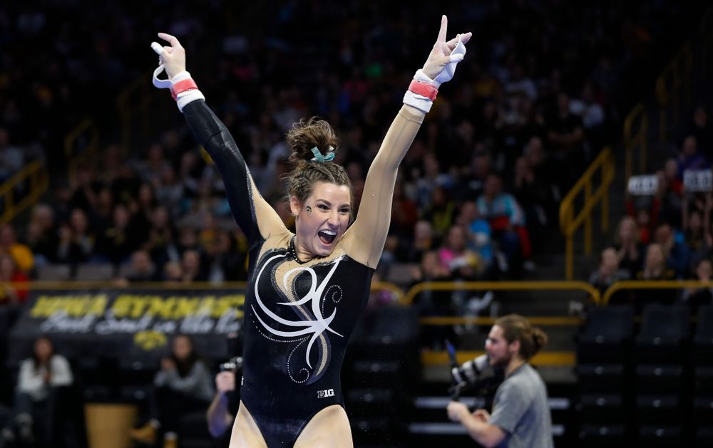 Iowa's Lanie Snyder competes on the bars against the Nebraska Cornhuskers 