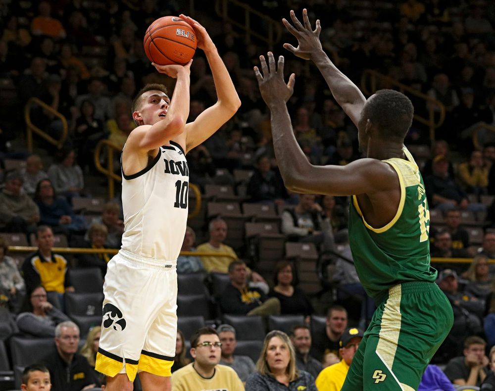Iowa Hawkeyes guard Joe Wieskamp (10) makes a 3-pointer during the second half of their game at Carver-Hawkeye Arena in Iowa City on Sunday, Nov 24, 2019. (Stephen Mally/hawkeyesports.com)