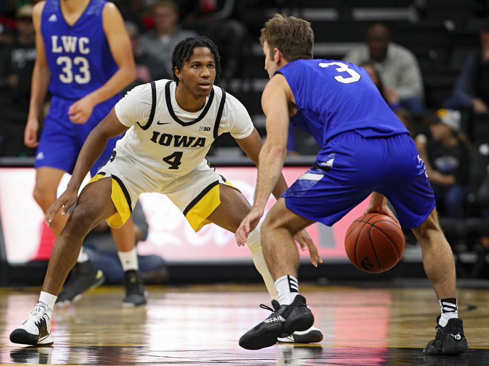 Iowa Hawkeyes guard Bakari Evelyn (4) eyes a player during the second half of their exhibition game against Lindsey Wilson College at Carver-Hawkeye Arena in Iowa City on Monday, Nov 4, 2019. (Stephen Mally/hawkeyesports.com)