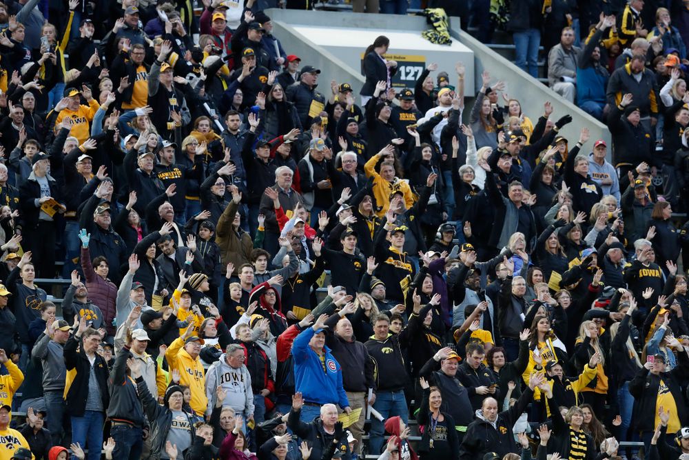 Fans wave to patients in the Stead Family Children's Hospital during Iowa Football's final spring practice Friday, April 20, 2018 at Kinnick Stadium. (Brian Ray/hawkeyesports.com)