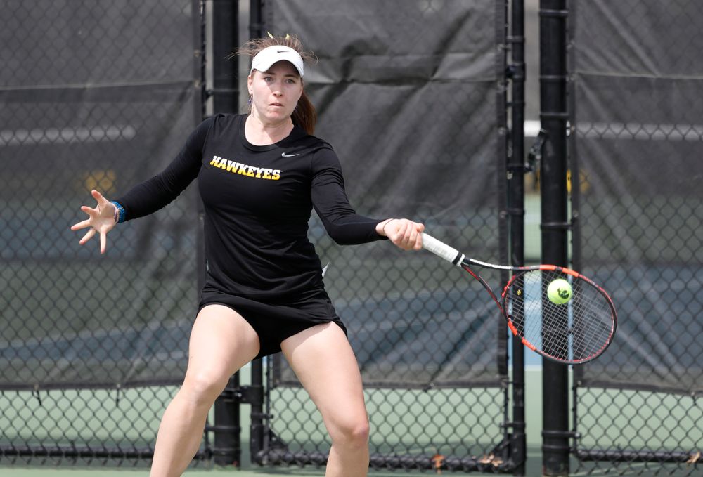 Iowa's Anastasia Reimchen against the Wisconsin Badgers Sunday, April 22, 2018 at the Hawkeye Tennis and Recreation Center. (Brian Ray/hawkeyesports.com)